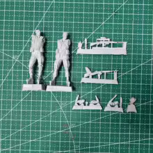 Detailed resin parts including sniper rifles and gear for Vietnam War model kit
